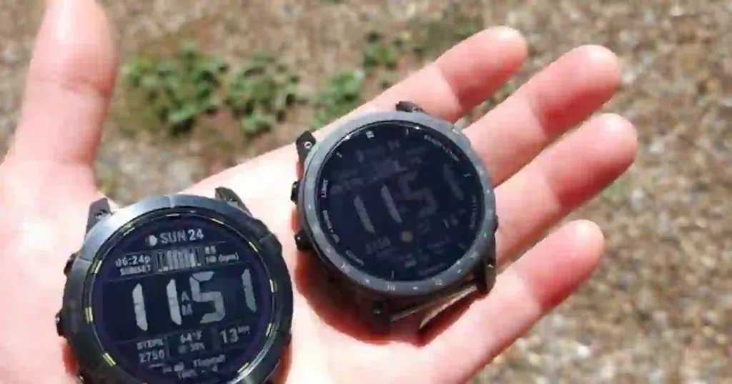 a hand holding a pair of watches AMOLED vs. MIP Displays in Garmin Devices